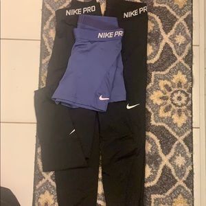 3 pairs of Nike pros
